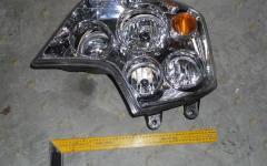 Фара передняя правая HOWO A7 WG9925720002